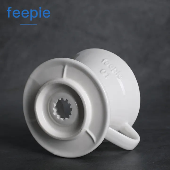 Feepie 01 V60 white ceramic coffee dripper on a wooden brew station