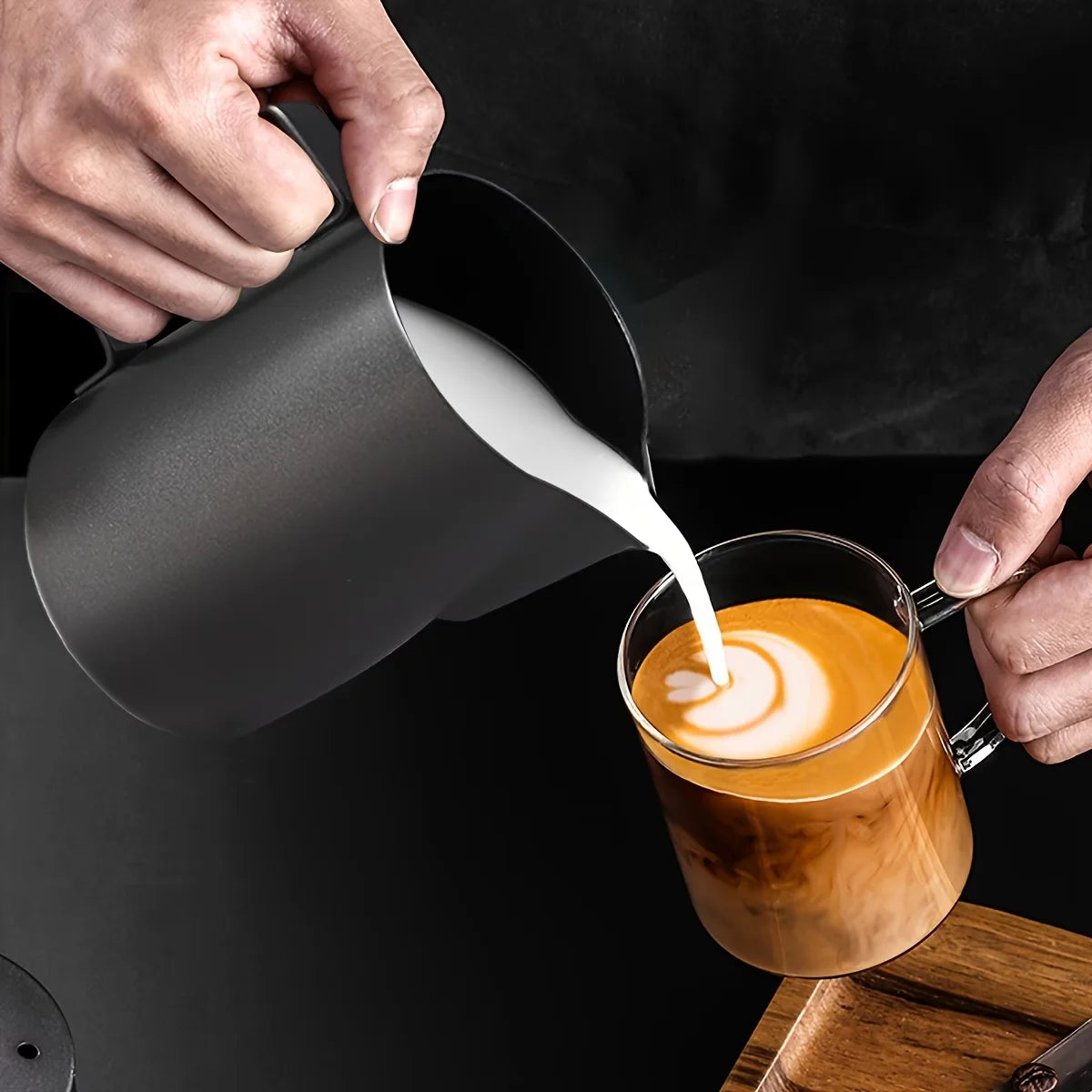 A matte black 350ml premium 304 stainless steel coffee milk pitcher featuring an ergonomic handle and a precision pour spout.