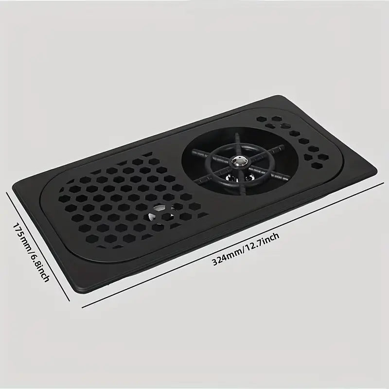 Crop Stainless Steel Rinser in matte black with a honeycomb drip tray and glass washer mechanism on a solid white background.