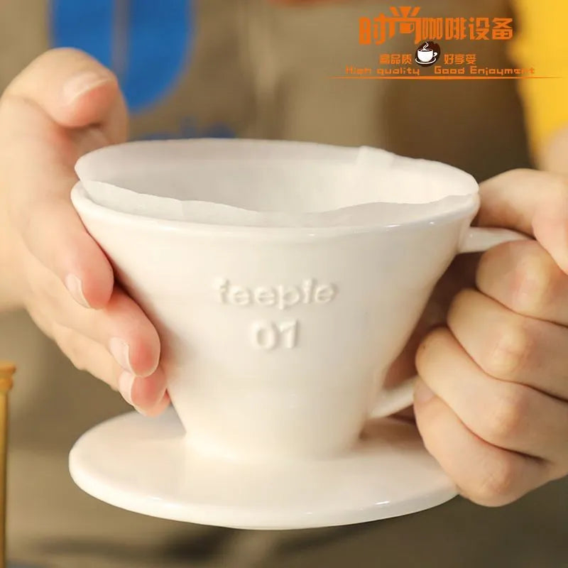 Feepie 01 V60 white ceramic coffee dripper on a wooden brew station