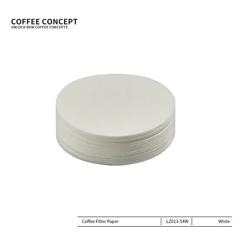 Round paper filter from the 100-Count Espresso Coffee Filter Papers pack placed inside a stainless steel portafilter.
